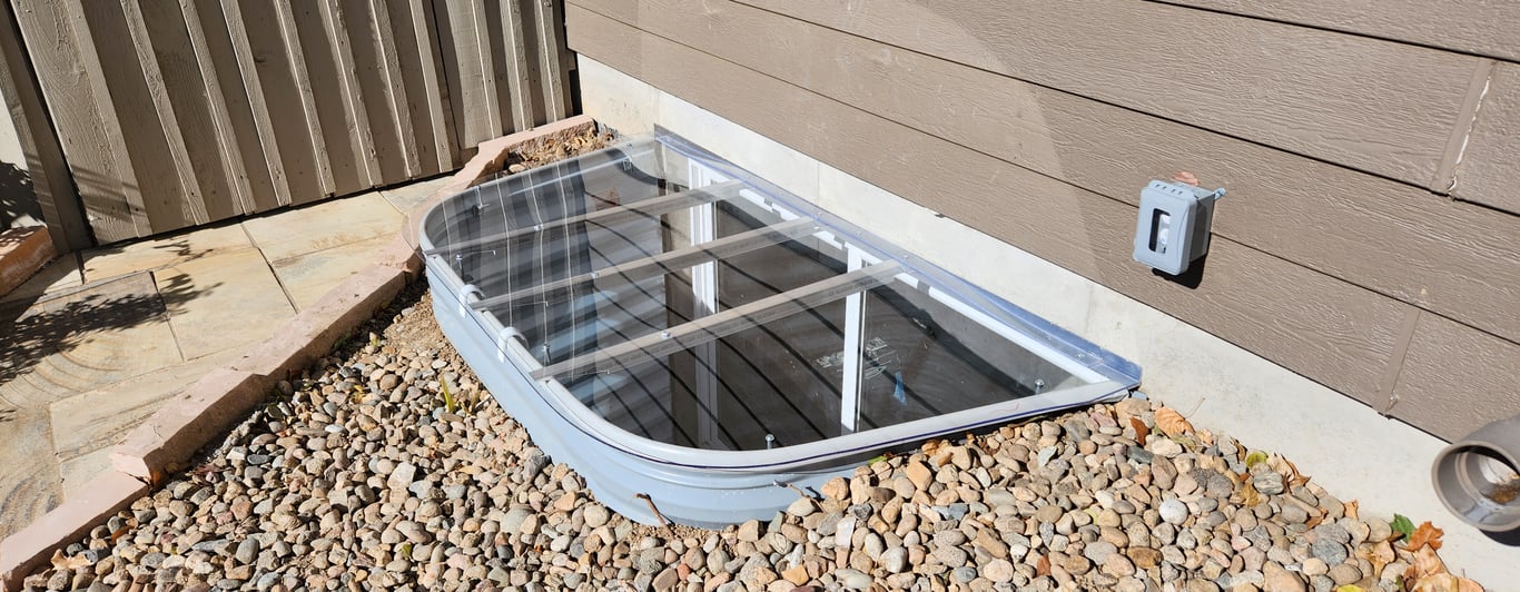 Egress window well cover with locks installed in Arlington Heights Illinois