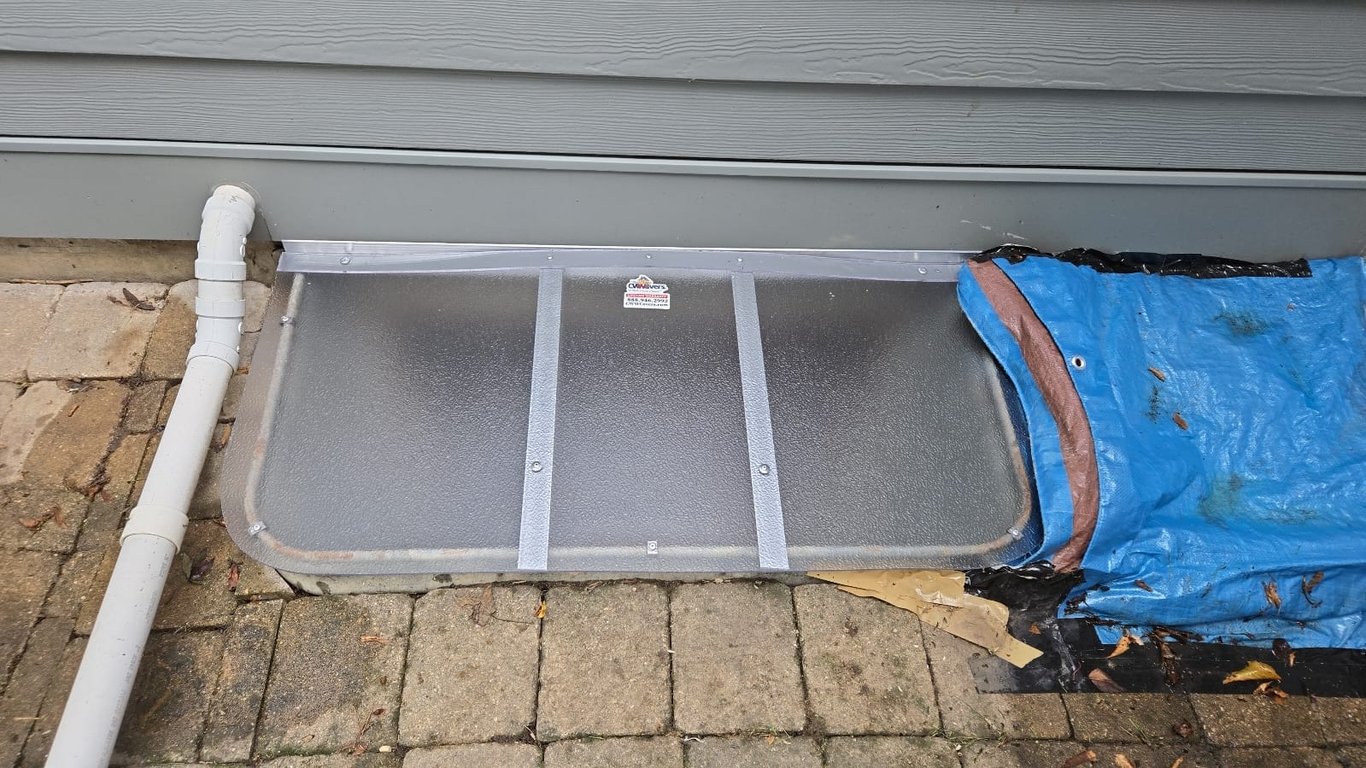 Frosted privacy window well cover installed in Greenfield Wisconsin