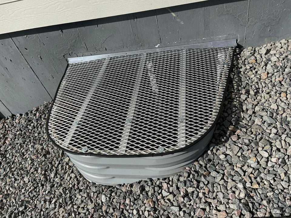 Custom metal window well cover 54x38 fabricated for window well in Colorado Springs Colorado