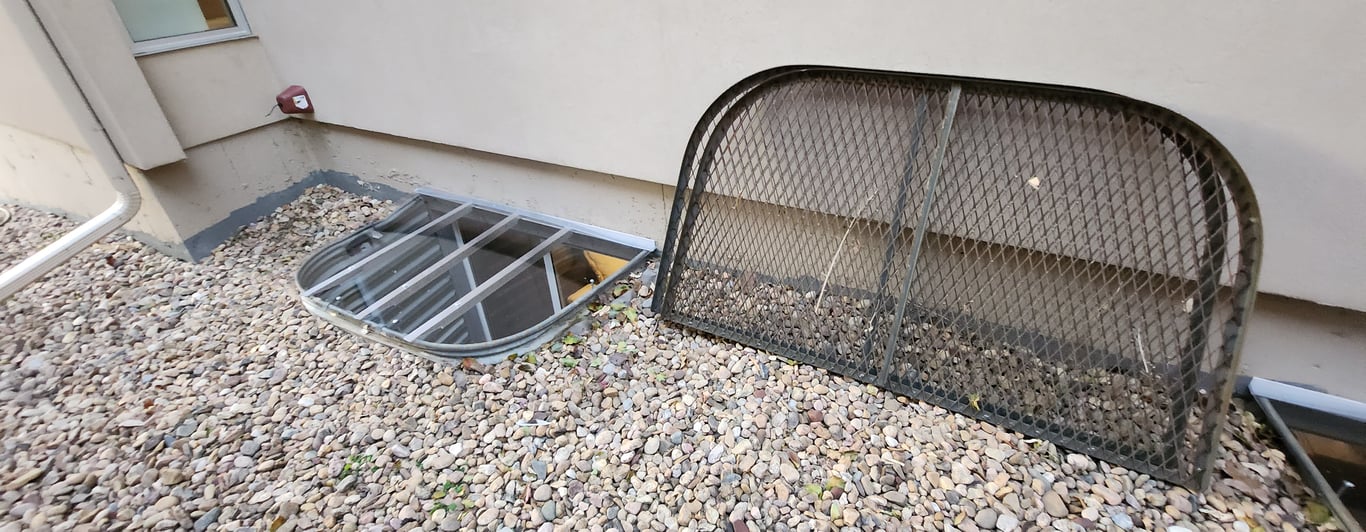 Replacing rusted metal grates with custom polycarbonate window well covers in Downers Grove Illinois