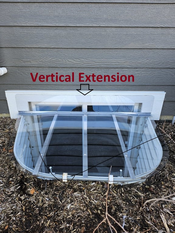 Heavy duty clear window well cover with vertical extension installed in Orland Hills Illinois supporting up to 800 lbs