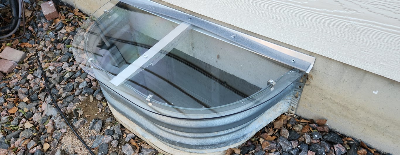 Polycarbonate window well cover improving basement safety in Island Lake Illinois