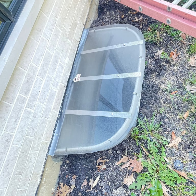 Frosted basement window well cover made from UV resistant polycarbonate in Montgomery Illinois