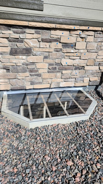 Custom clear polycarbonate window well cover 75x45 installed in Elmhurst Illinois