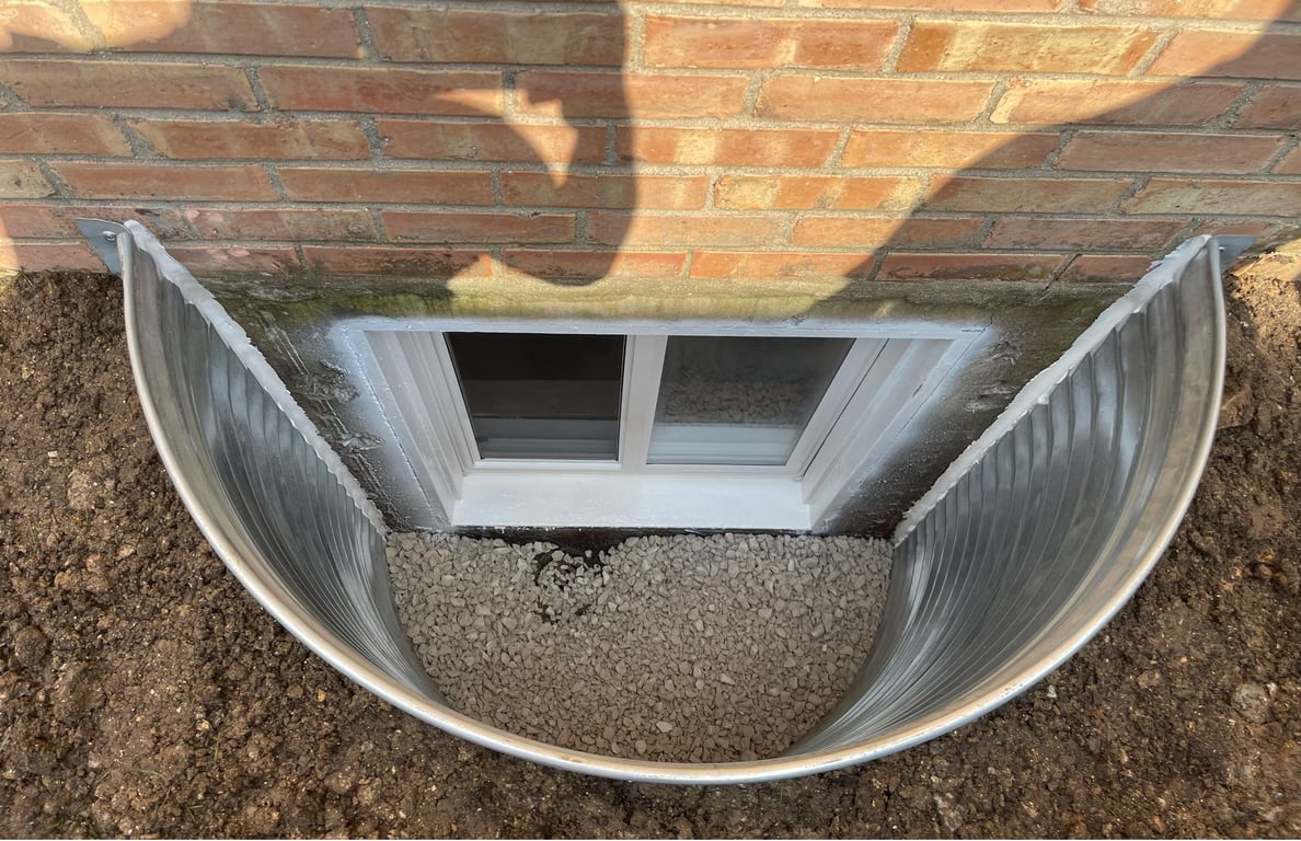 Window well replacement with a new basement window installed in Lisle Illinois