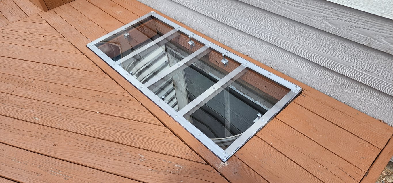 UV resistant crystal clear window well cover custom built on site in Crown Point Indiana