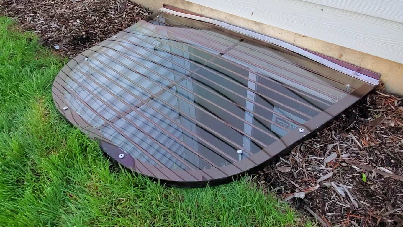 Overlay custom polycarbonate window well cover with locks installed in La Grange Illinois