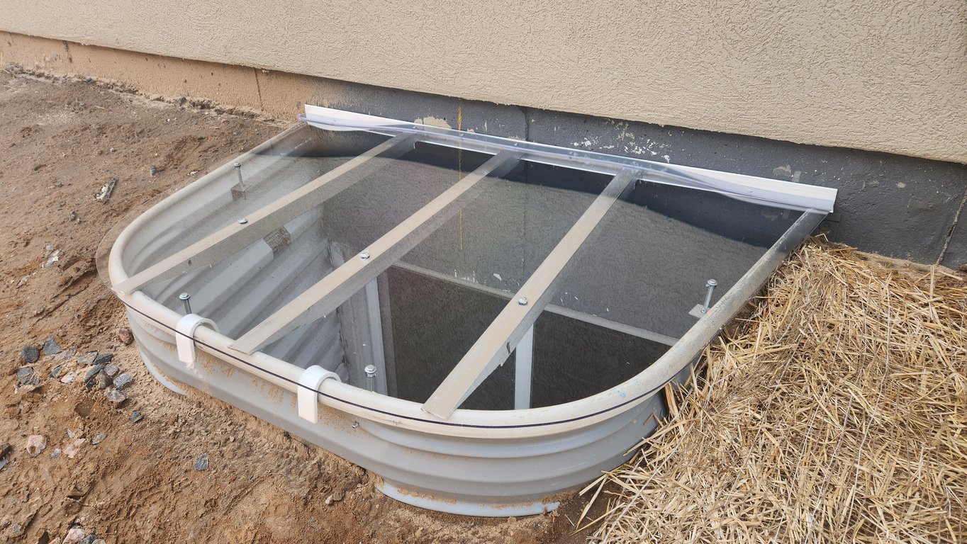Custom basement window well cover installed in Blue Island Illinois