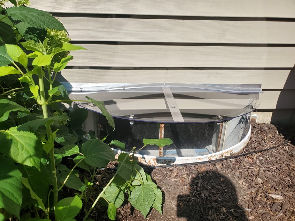 Window well extension riser made of polycarbonate installed in Wheeling Illinois