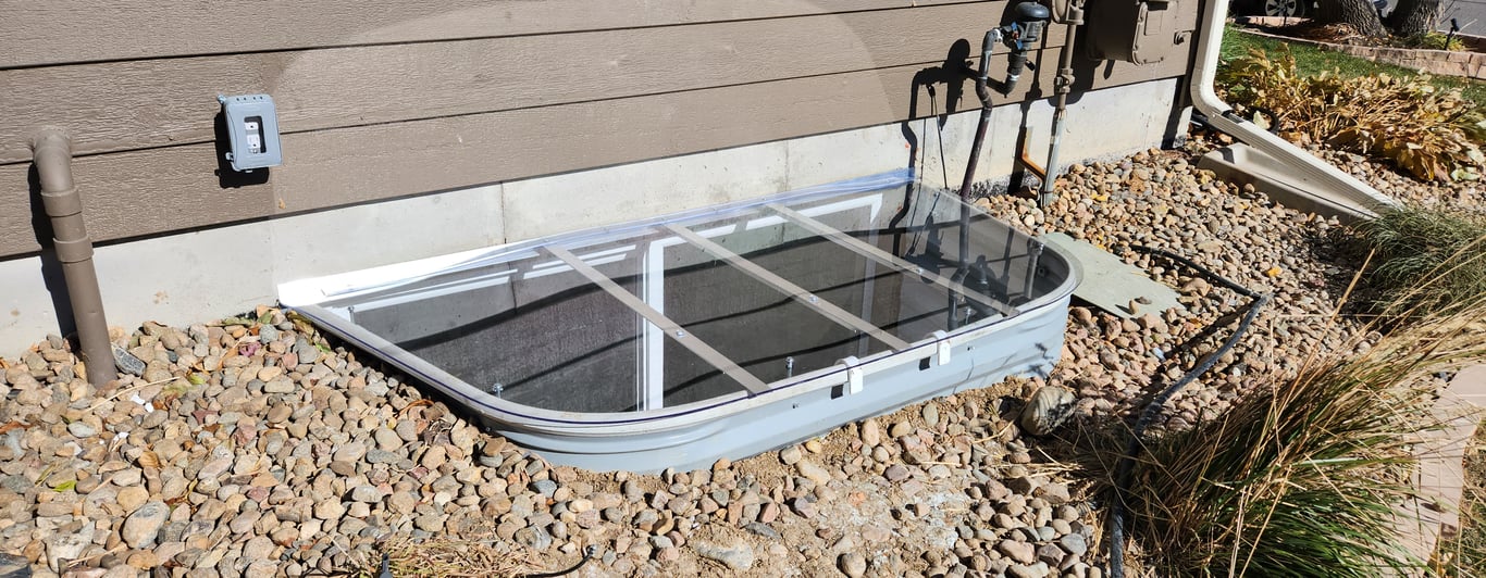 Window well replacement in Algonquin Illinois with gravel base for drainage and stability installed by USA Window Well Covers