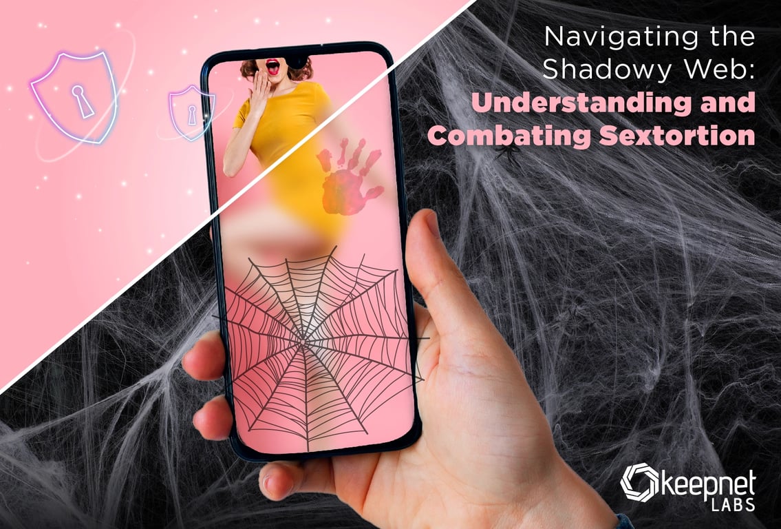 a person holding a cell phone with a spider web on it
