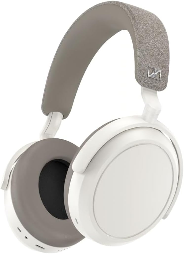Ultra-realistic display of Sennheiser Momentum 4 Wireless headphones with matte aluminum ear cups, set against a white background