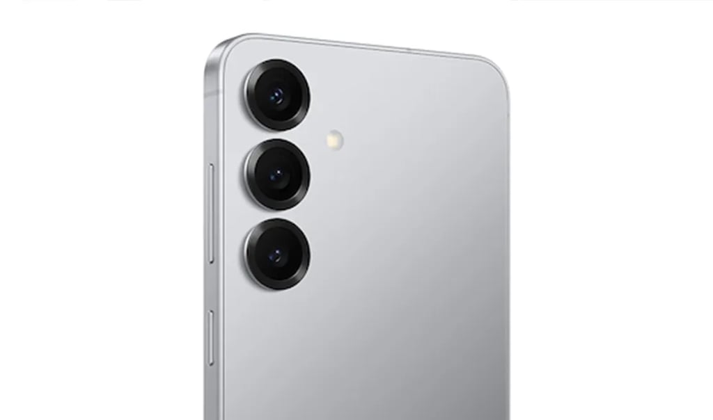 Close-up of Samsung Galaxy S25 rear camera system showing three vertically aligned lenses with LED flash on a silver back panel.