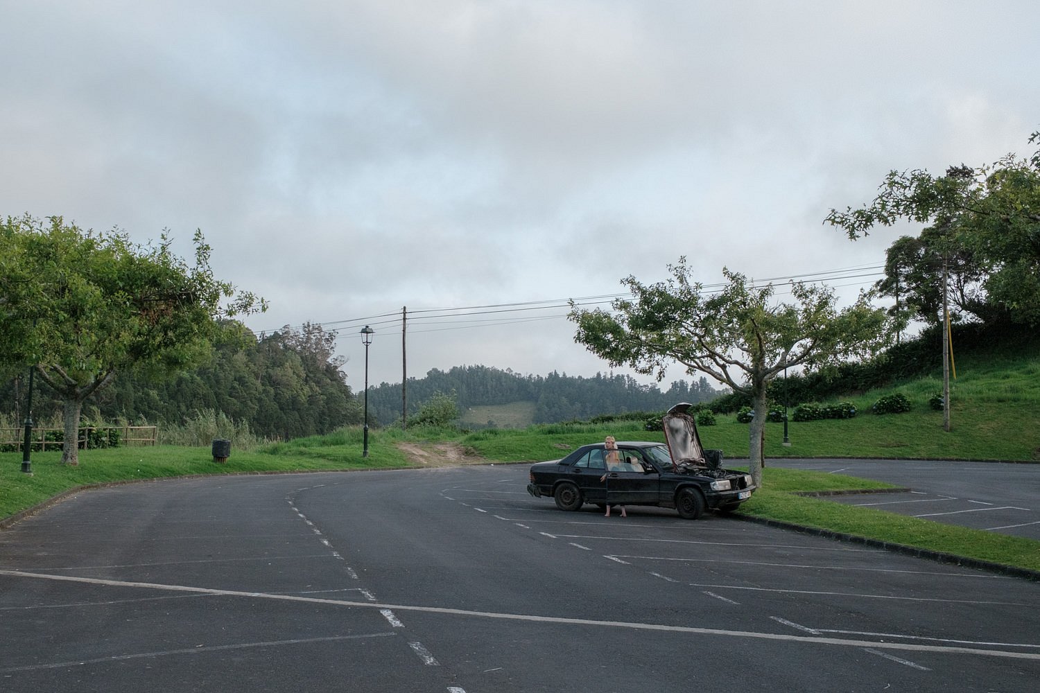 Broken down car in carpark