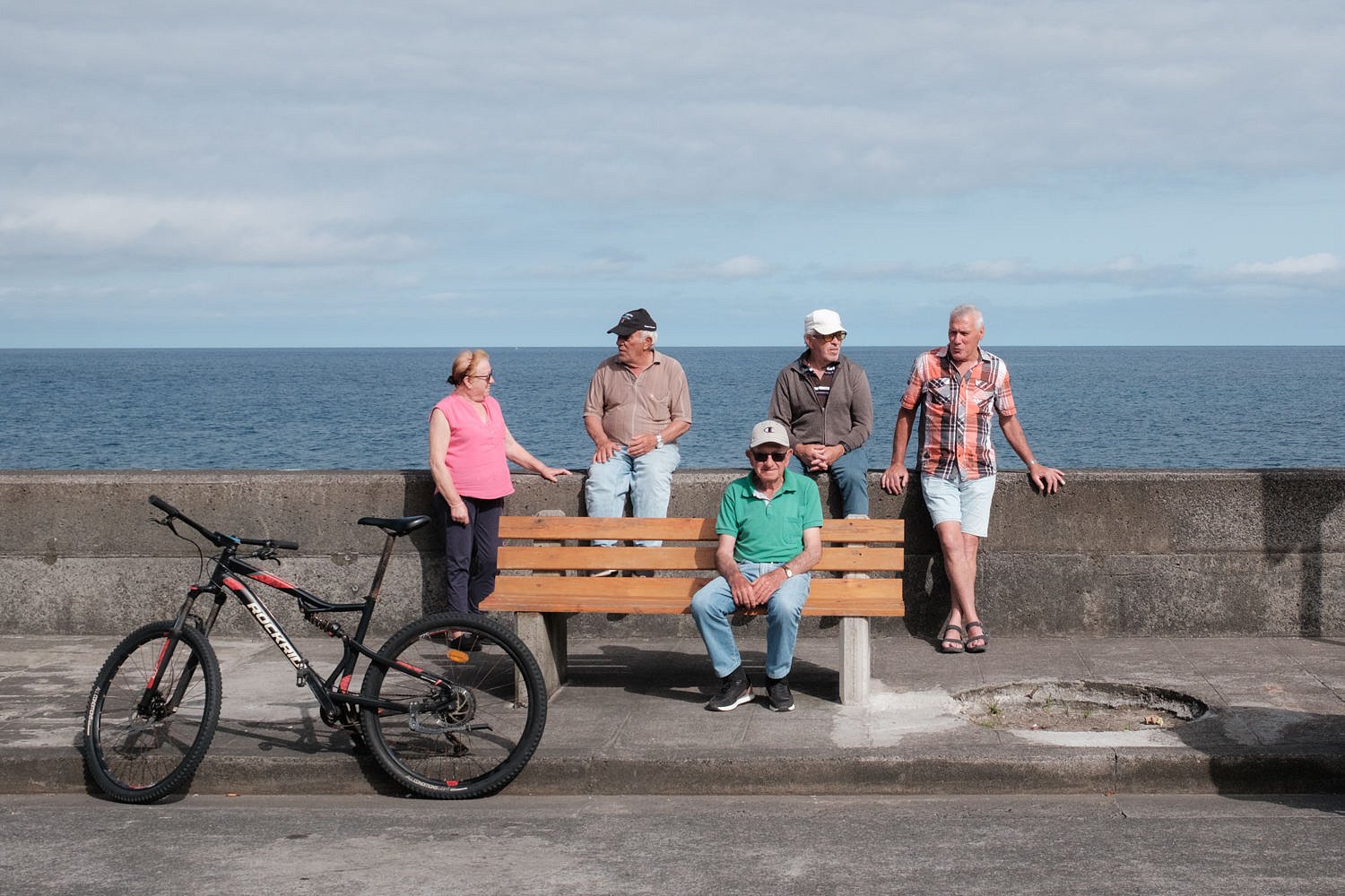Friends around a bench