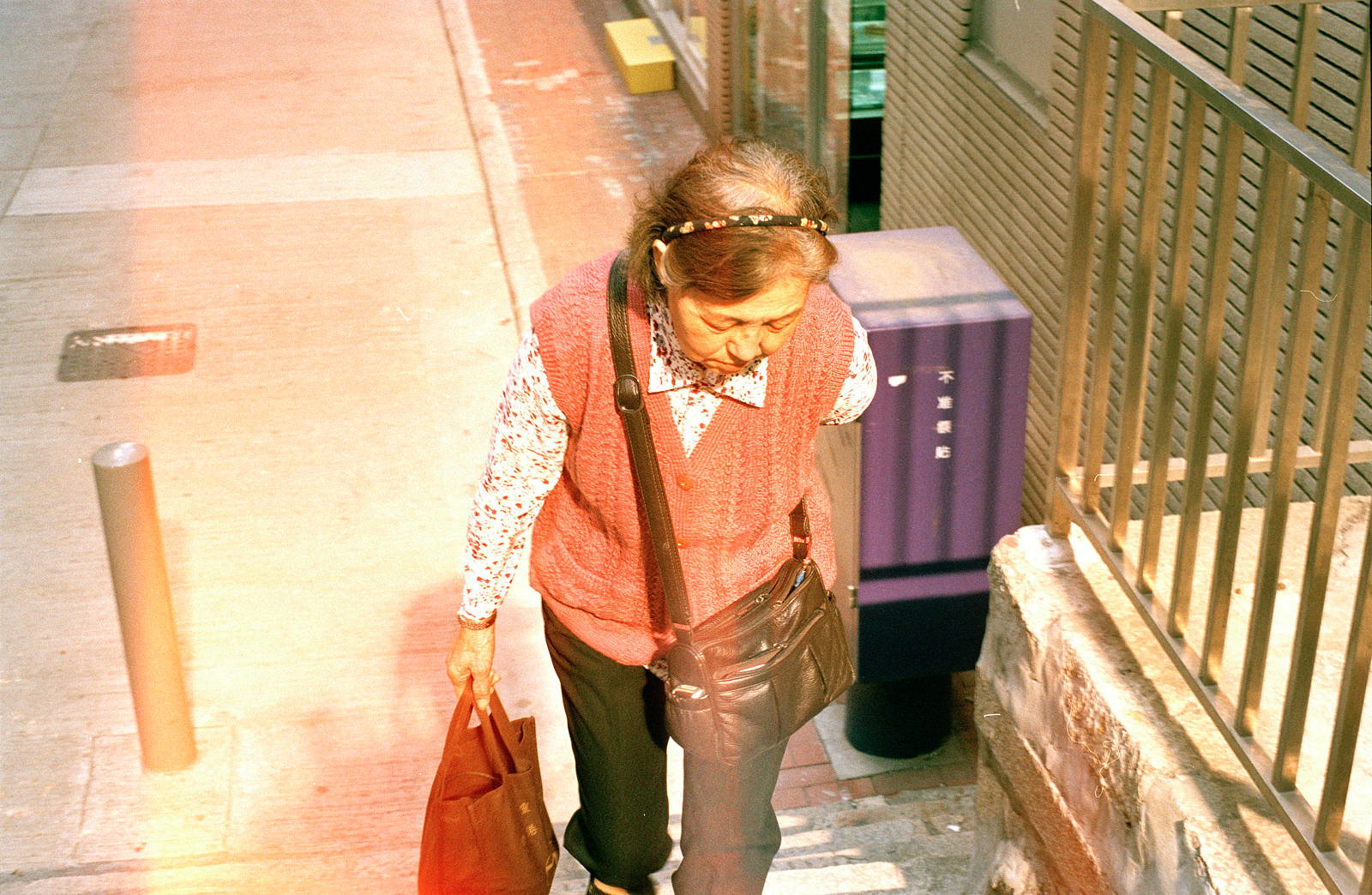 Woman ascending stairs
