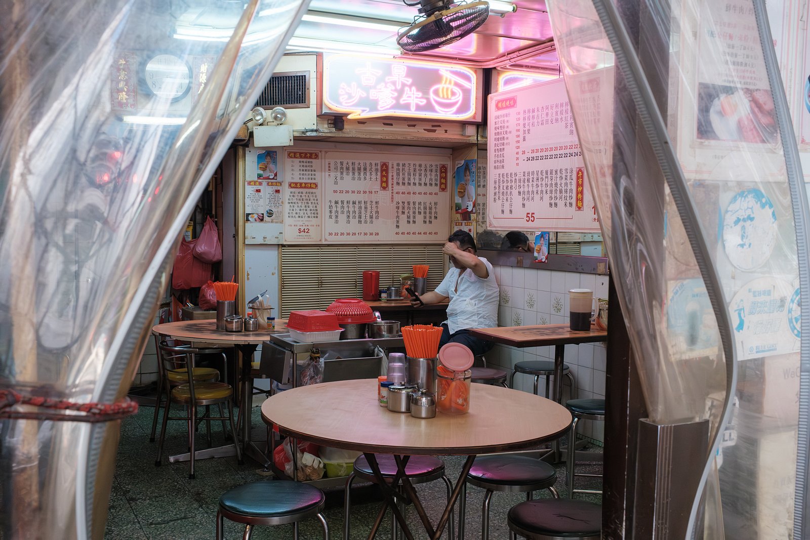 Man sitting in empty restaurant