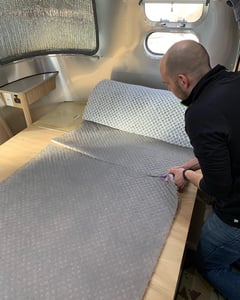 Man Cutting Aire Flow Material