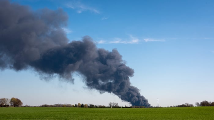 Image for Fire on NW F in Richmond sends plume of smoke into the air.