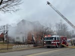 Image for Stuff piled in burning structure makes Richmond firefighters' job more difficult