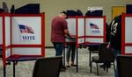 Image for Voting begins at courthouse