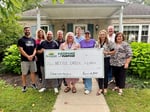 Image for Keystone Cooperative gifts Nettle Creek lunch debt relief 