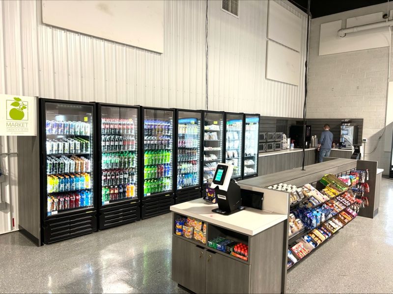 Restocking fresh food in a DFW corporate break room micro market