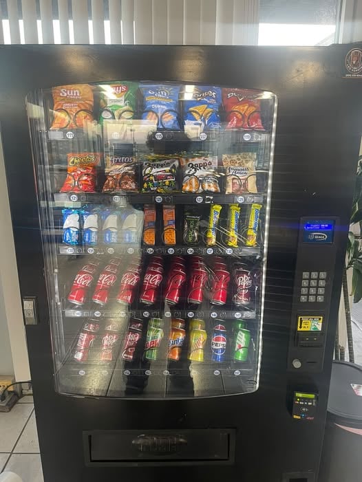Shelf-stable workplace vending machine used before a fresh-food cooler upgrade