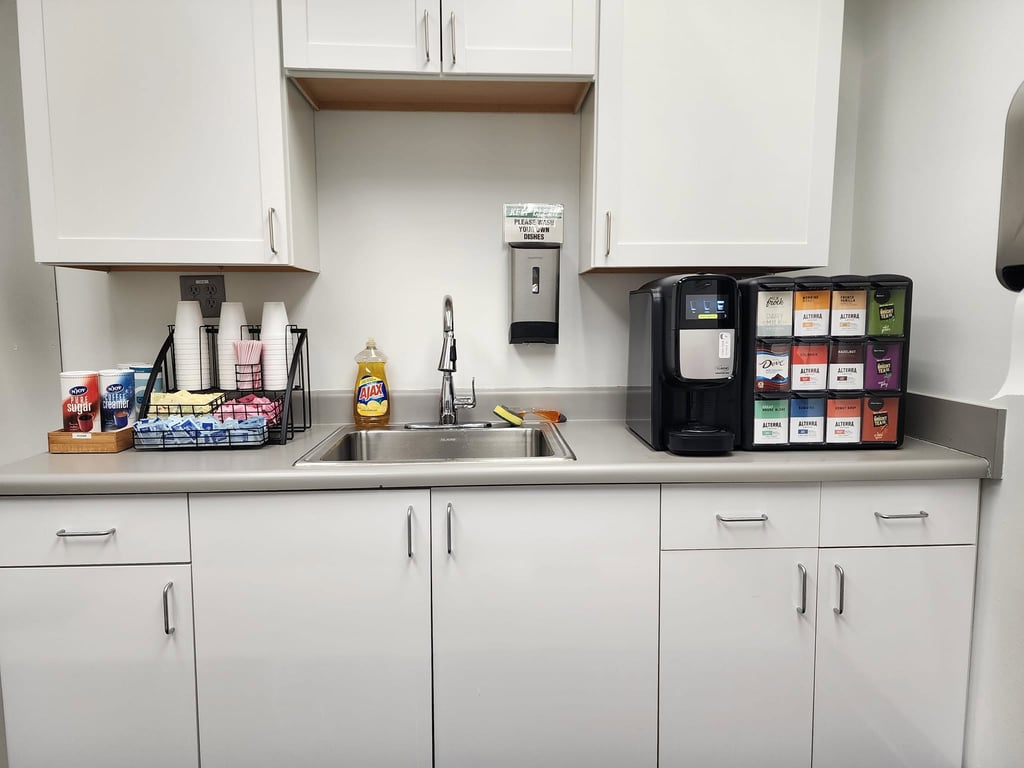 Stocked workplace refreshment area supporting a micro market program