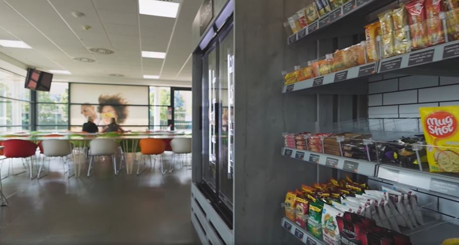 Self-checkout station in a workplace micro market