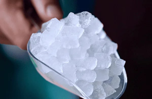 Nugget ice collected beneath an office water dispenser