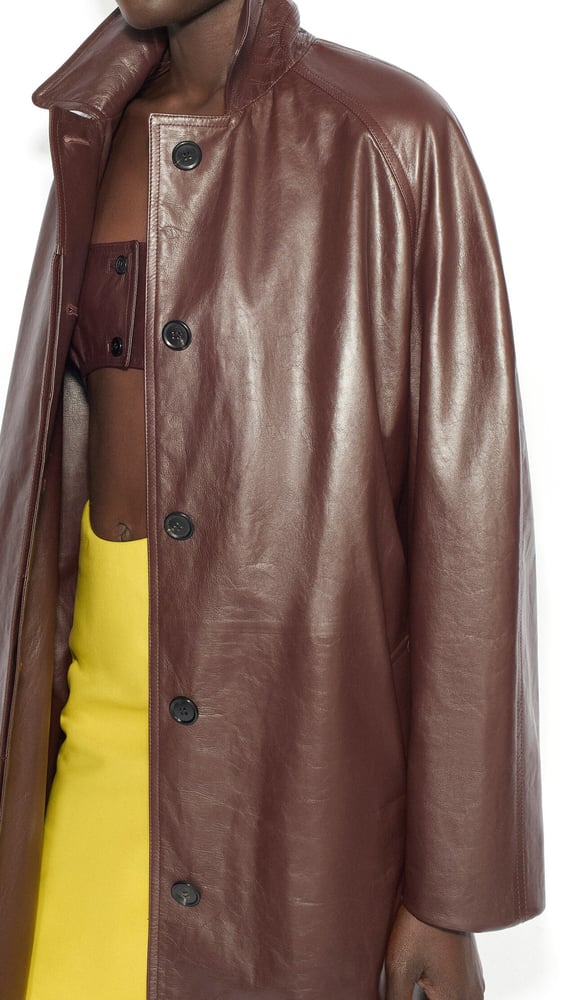 ENSEMBLE MANTEAU ET BRALETTE EN CUIR