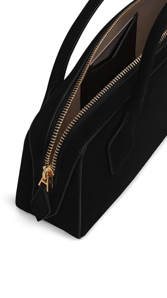 LE TECKEL CLUTCH EN SUÈDE