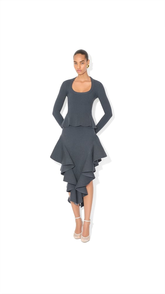 TOP PEPLUM EN MAILLE