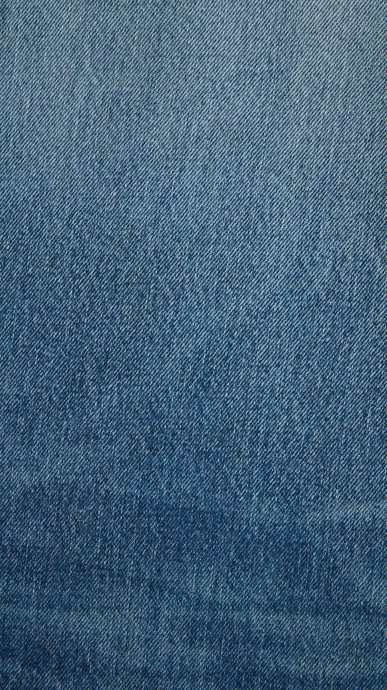 JEAN ÉVASÉ EN DENIM