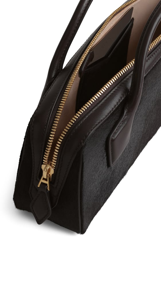 LE TECKEL CLUTCH EN CUIR PONY