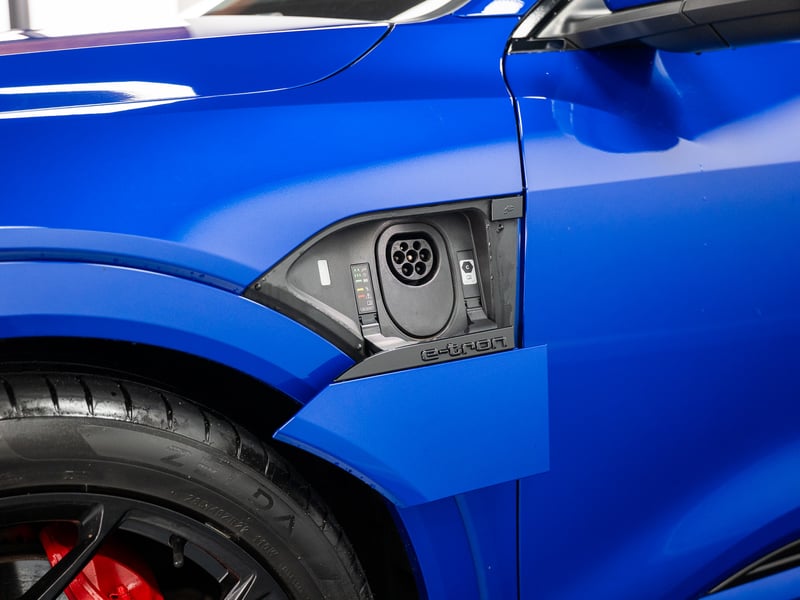 2023 Audi Q8 Etron or £25,000