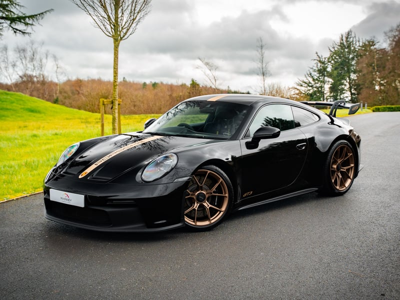 Porsche 911 GT3 or £100,000