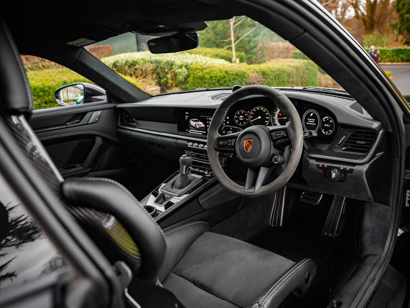 Porsche 911 GT3 or £100,000