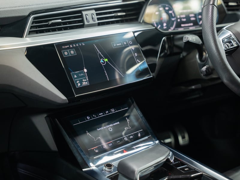2023 Audi Q8 Etron or £25,000