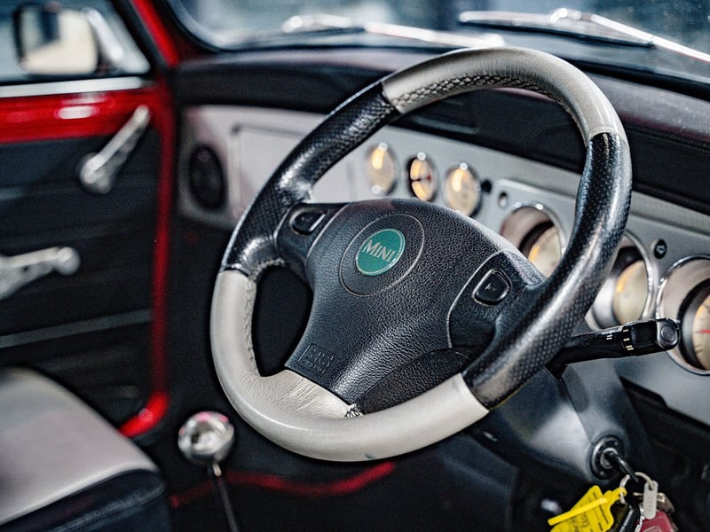 2001 Mini Cooper Sport or £15,000