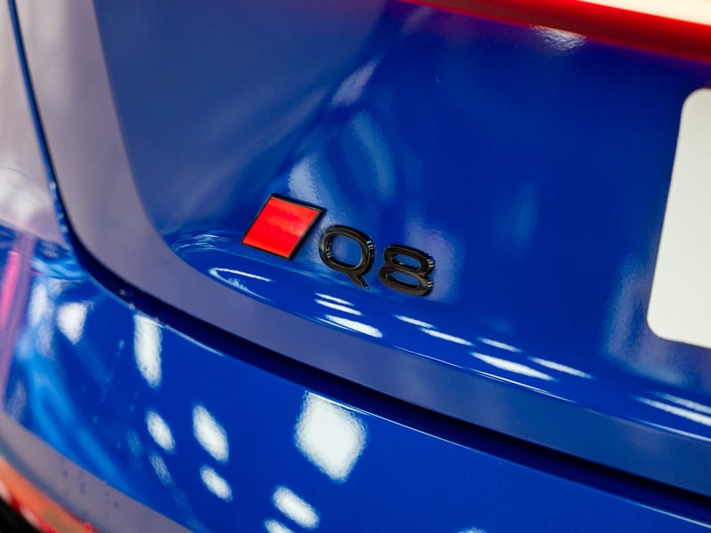 2023 Audi Q8 Etron or £25,000