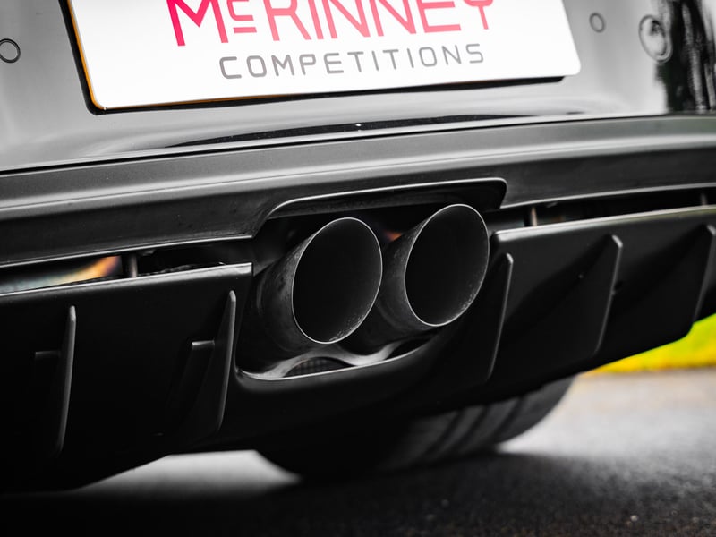 Porsche 911 GT3 or £100,000