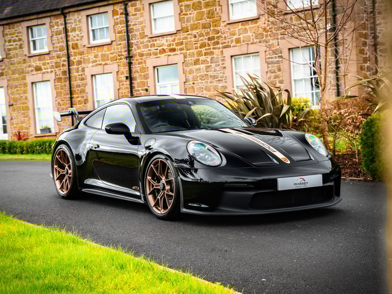 Porsche 911 GT3 or £100,000