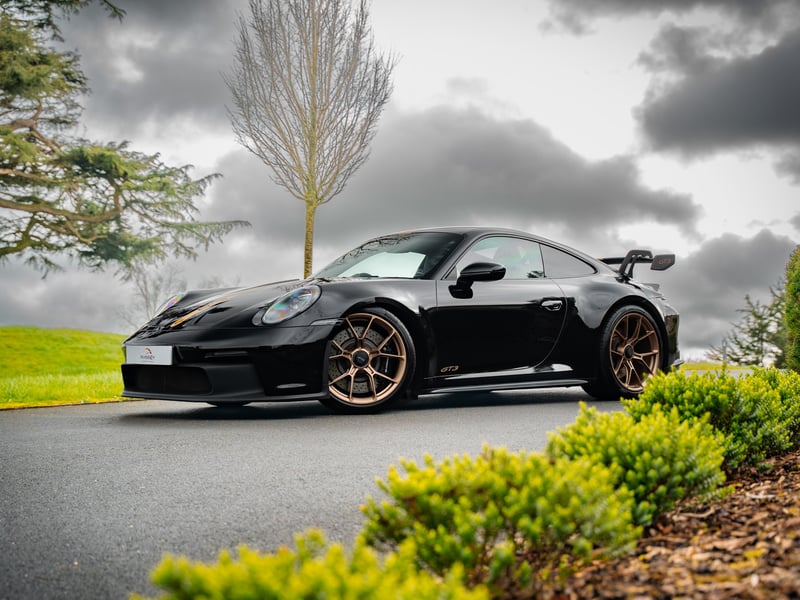 Porsche 911 GT3 or £100,000