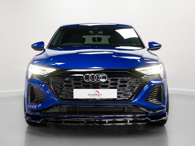 2023 Audi Q8 Etron or £25,000