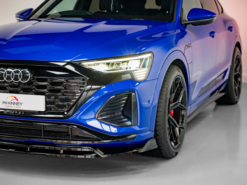 2023 Audi Q8 Etron or £25,000