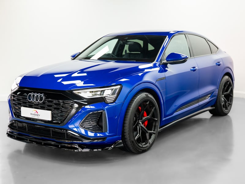 2023 Audi Q8 Etron or £25,000