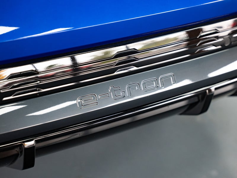 2023 Audi Q8 Etron or £25,000