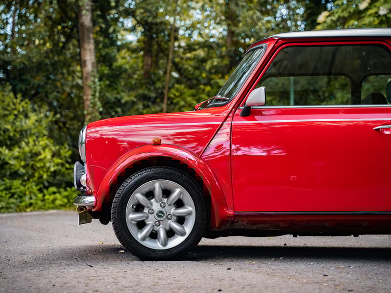 2001 Mini Cooper Sport or £15,000